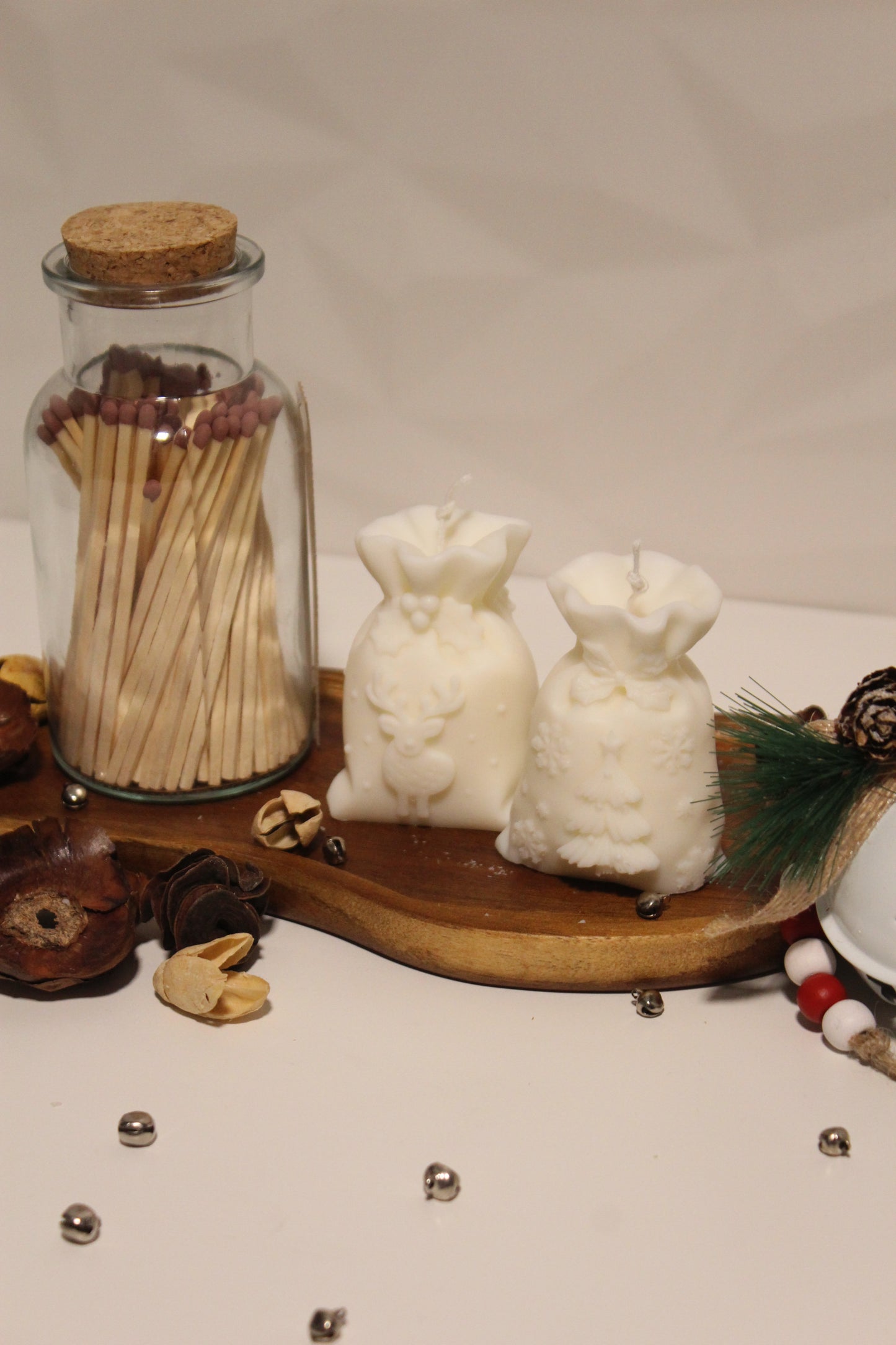 VELA DECORATIVA SACO DE PRESENTES